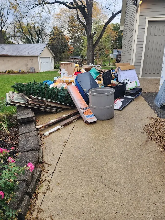 Dumpster being loaded with debris for 30 Yard Dumpster Rental in New Square
